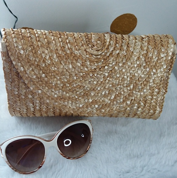 @emelycuyuch Handbags - Straw knit clutch